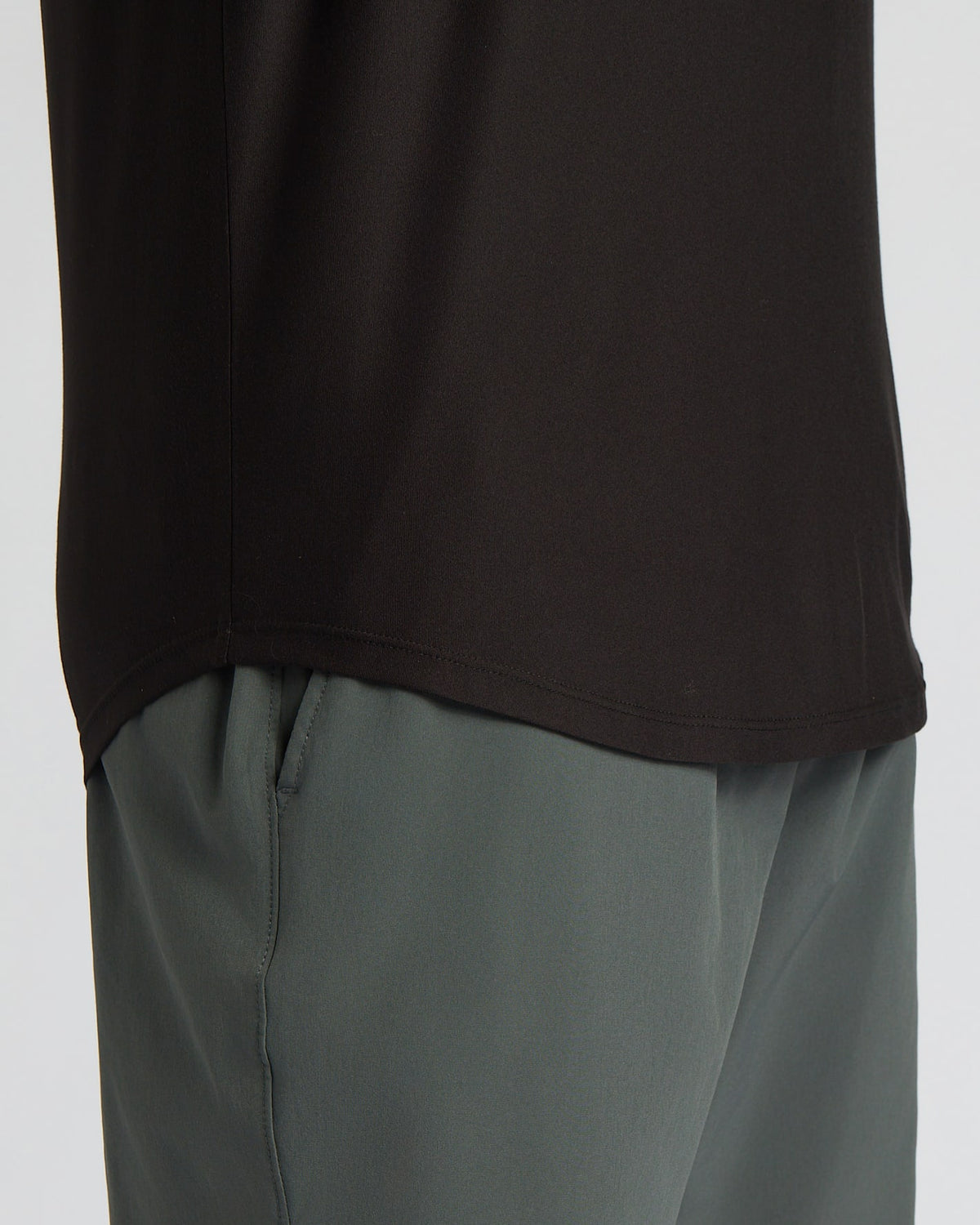 Close-up of the curved hem detail on the All Black Active Curved Hem Crew 6-Pack, highlighting the smooth black fabric as part of men's basics clothing.
