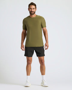 True ClassicMan wearing Military Green Active Crew Neck Tee and black shorts.