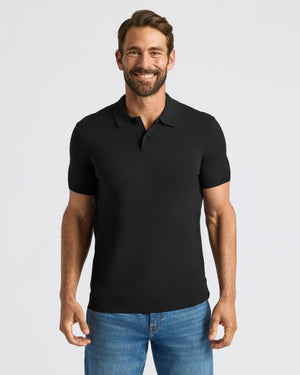 Man wearing Black Dressy Polo, showcasing its updated fit and style.