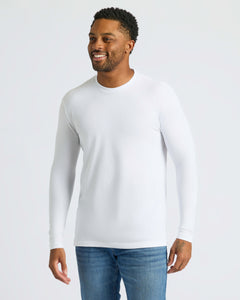True ClassicMan wearing Core Long Sleeve Crew Neck T-Shirt in white with blue jeans.
