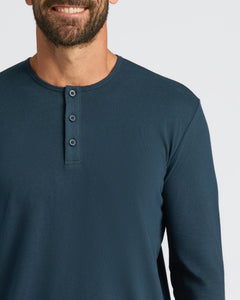 True ClassicMan in Navy Classic Long Sleeve Henley, smiling against a light background.