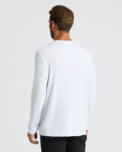 True ClassicWhite Waffle Long Sleeve Crew Neck on man, back view, light-gray background.
