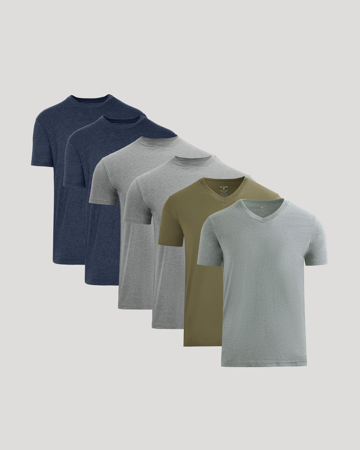 Six-pack of short sleeve t-shirts in navy, dark gray, light gray, olive, and light blue colors.