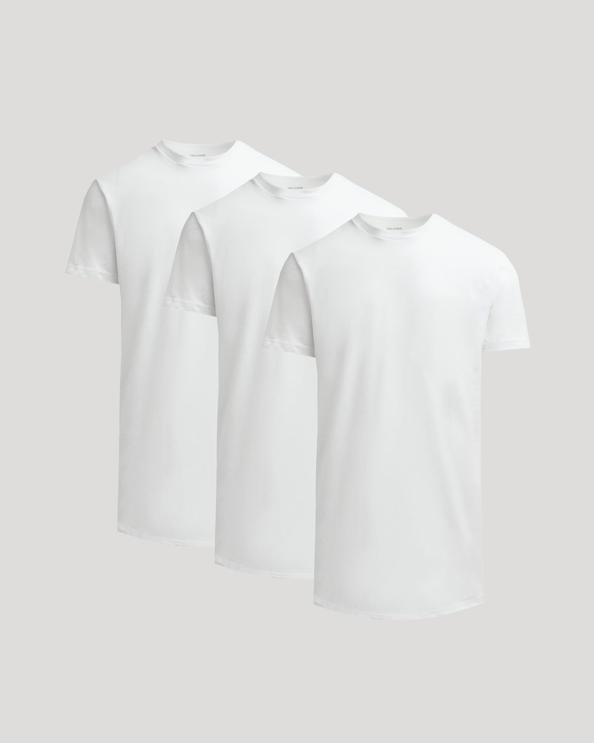 Three plain white crew neck t-shirts with a curved hem, shown together as the All White Tall Heavyweight Curved Hem Crew 3-Pack, ideal men's basics.