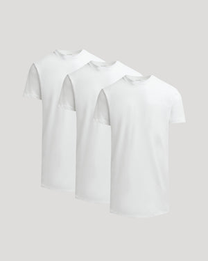 Three white True Classic Men's Tall Heavyweight Curved Hem Crew – Premium Heavyweight Cotton Blend, Extended Length, Athletic Fit, Structured Everyday T-Shirts displayed against a neutral background.