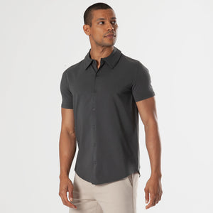 True ClassicCarbon Short Sleeve Knit Shirt worn with beige trousers.