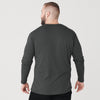 Man wearing Carbon Classic Long Sleeve Henley, viewed from behind.