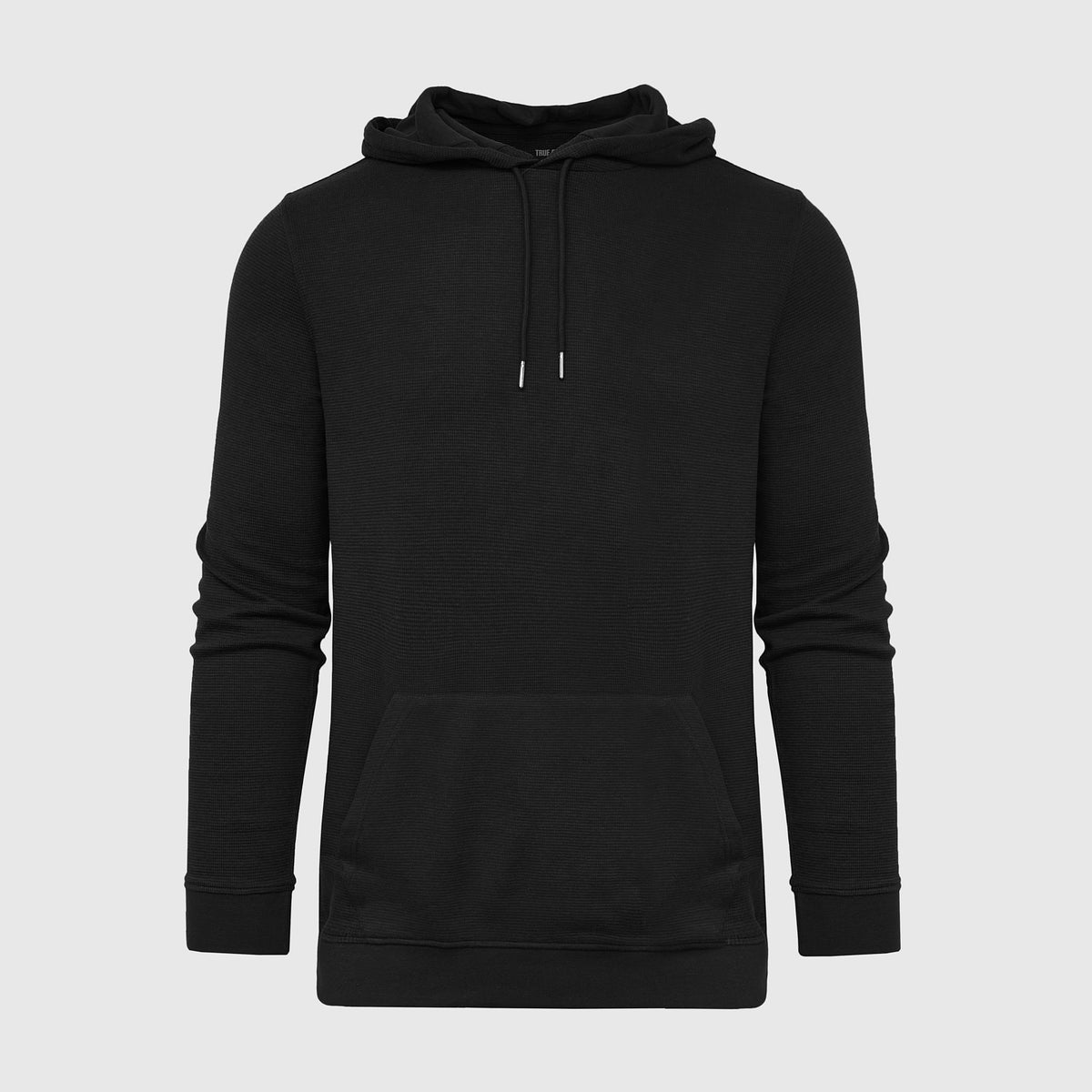 Black Waffle Hoodie with drawstrings and kangaroo pocket.