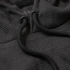 Carbon Waffle Hoodie with metal eyelets and drawstring on waffle-knit fabric.