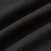 Carbon Waffle Hoodie showcasing waffle-knit texture and gentle fabric folds.