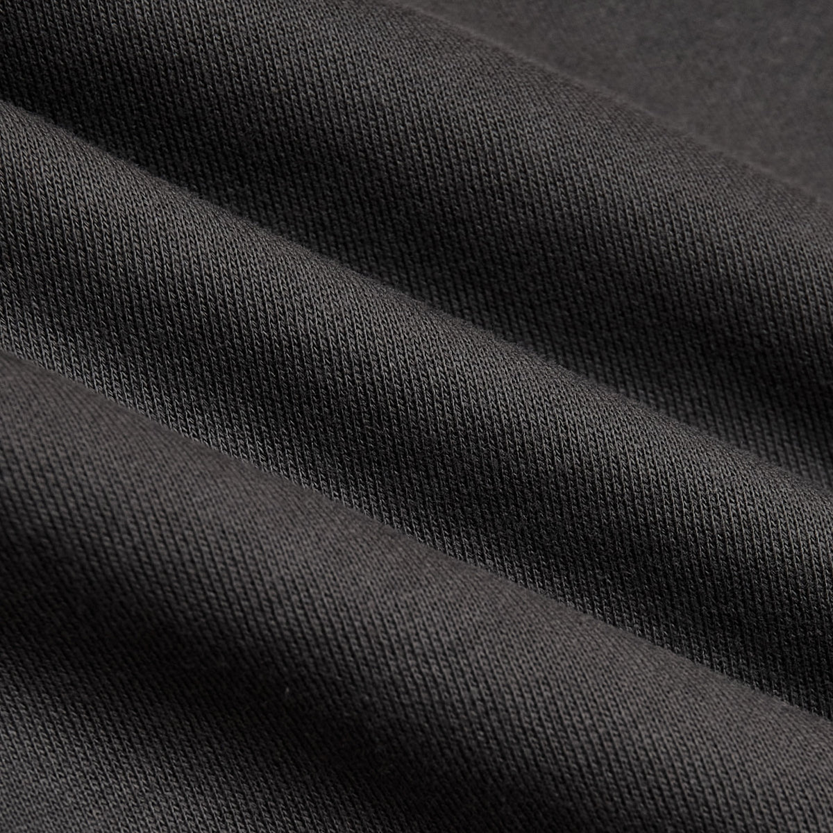 Carbon Fleece French Terry Zip Hoodie close-up showing knit texture.